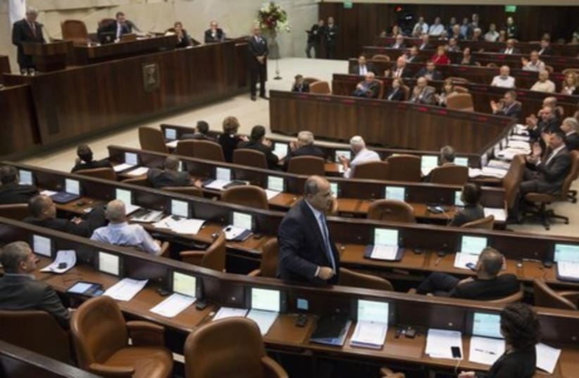 Lawmakers gather for a session in the Knesset. (photo credit: REUTERS)