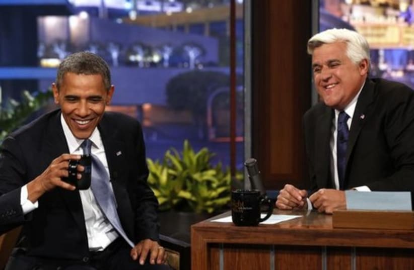 Former 'Tonight Show' host Jay Leno hosting President Obama. (photo credit: REUTERS)