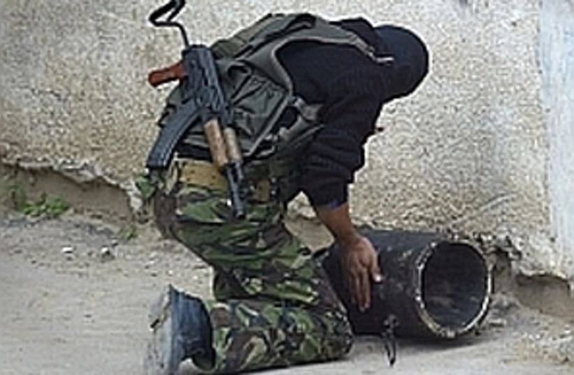 terrorist with explosive (photo credit: AP [file])