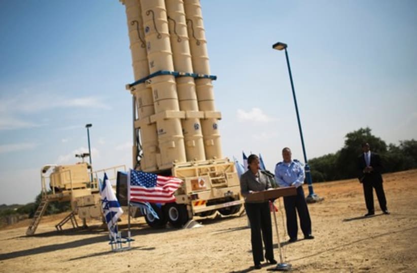 US National Security Adviser Susan Rice addresses the media as she stands in front of a launcher of an Arrow II ballistic missile interceptor, at the IAF Palmahim base. (photo credit: REUTERS)