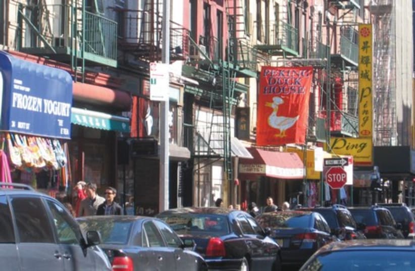 New York City's Chinatown during rushhour traffic. (photo credit: BEN G. FRANK)