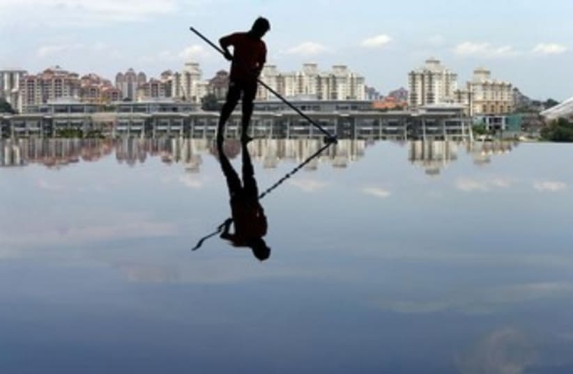 Reflection in water (photo credit: REUTERS)