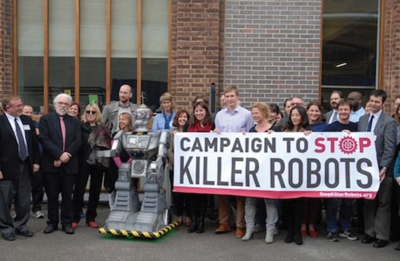 Protesters against the use of killer robots jump-start their campaign during a demonstration outside the Frontline media club in London on April 23. (photo credit: STOPKILLERROBOTS.ORG)