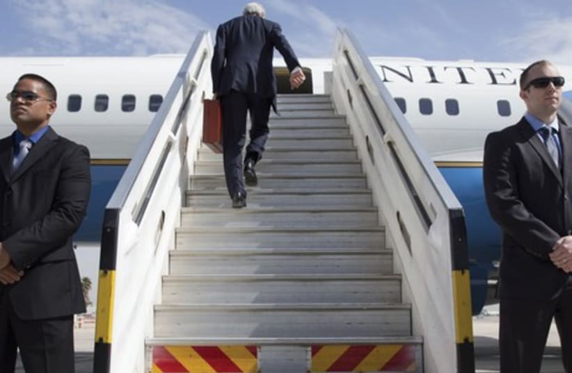 Turning his back on the peace process?: US Secretary of State John Kerry leaves Tel Aviv, April 1, as Israeli-Palestinian peace talks collapse (photo credit: JACQUELYN MARTIN / POOL / REUTERS)