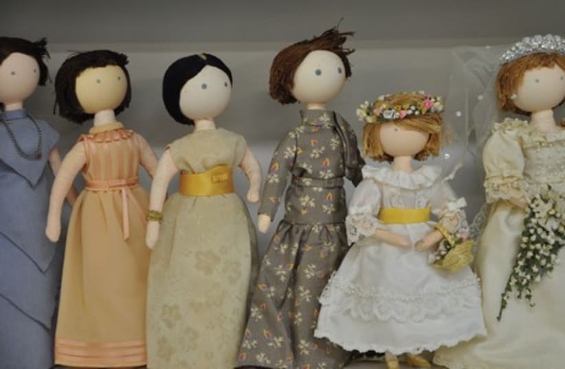 HAPPY FAMILIES: Some of the dolls handmade by Rebecca Schuleberg, part of the collection at the Israel Museum’s Youth Wing. (photo credit: COURTESY: IMJ)