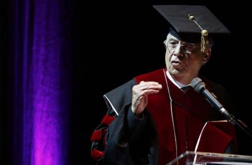 Former Brazilian president Fernando Henrique Cardoso gestures as he gives a speech after receiving an honorary doctorate at Tel Aviv University. (photo credit: REUTERS)