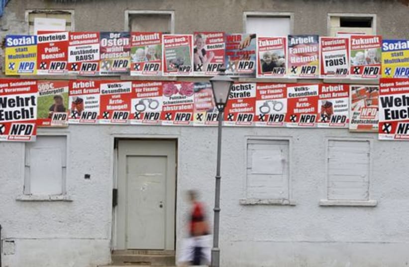 Election banners of the far-right German National Democratic Party (NPD) are pictured in village of Zwenkau (photo credit: REUTERS)