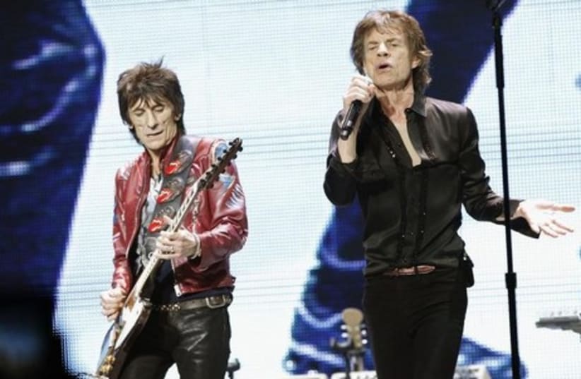 Mick Jagger (R) and Ronnie Wood of The Rolling Stones.  (photo credit: REUTERS)