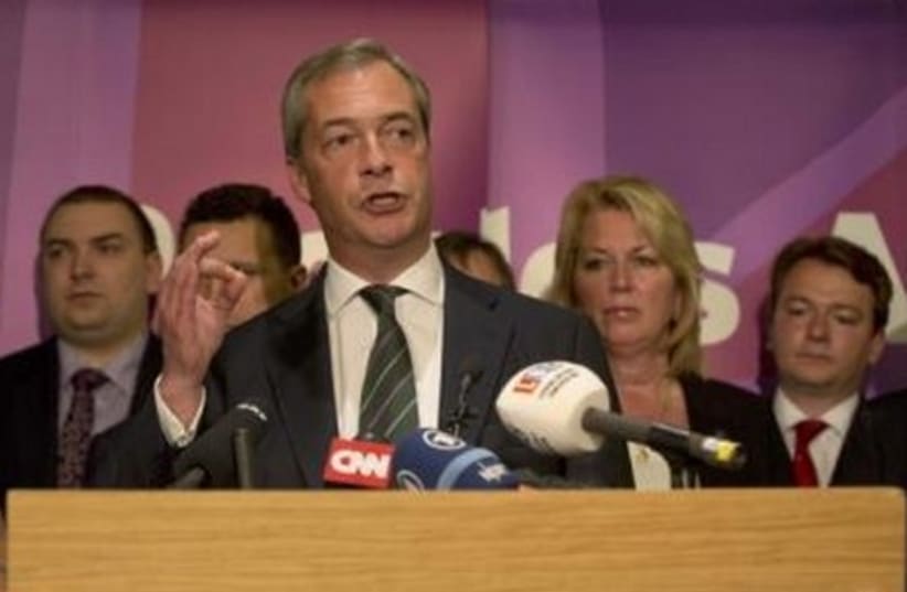 UK Independence Party leader Nigel Farage delivers a speech in London after sweeping to victory in the European elections. (photo credit: REUTERS)