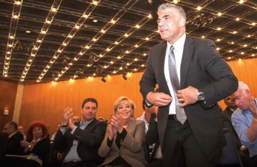 Can Yair Lapid and Yesh Atid buck the flash-in-the-pan-and-implode syndrome of centrist party successes ? (photo credit: FLASH 90)