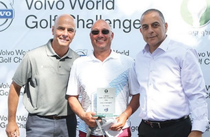 VOLVO GOLF TOURNAMENT champion, Moti Fishman (center), poses with Caesarea Golf Club General Manager Lior Prety (left) and Volvo National Representative Nachum Chugi (right) following his victory last week (photo credit: Courtesy)