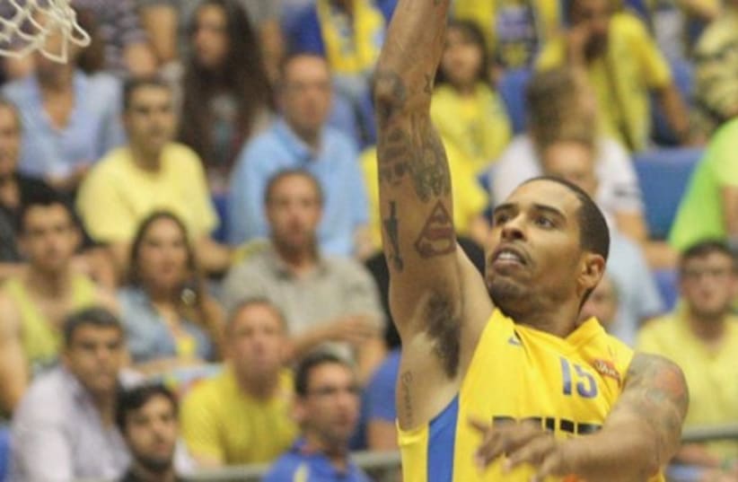 Maccabi Tel Aviv forward Sylven Landesberg was one of six yellow-and-blue players in double figures in last night’s victory over Hapoel Eilat at Nokia Arena, scoring 12 points. (photo credit: ADI AVISHAI)