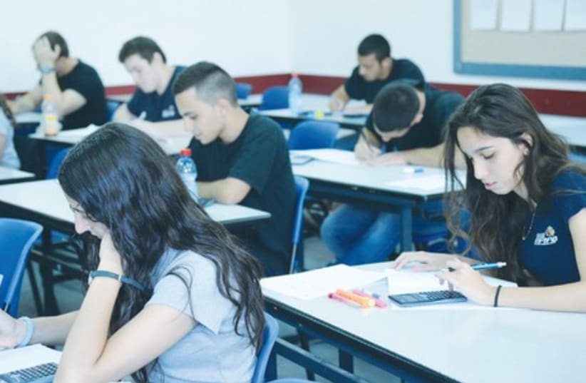Students in the Kiryat Sharet high school in Holon take their matriculation exams in mathematics. (photo credit: YOSSI ZELIGER,FLASH 90)