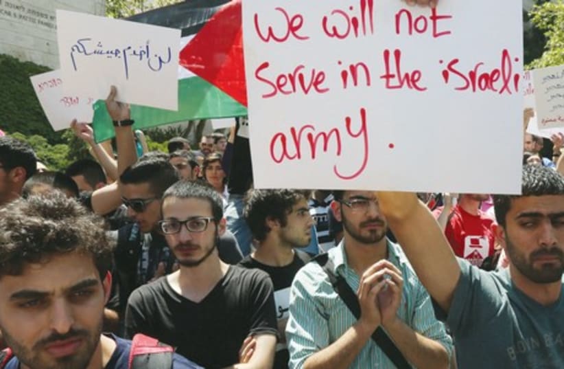 ARAB STUDENTS on the Hebrew University campus protest conscription for Christian and Druse citizens last month. (photo credit: MARC ISRAEL SELLEM)