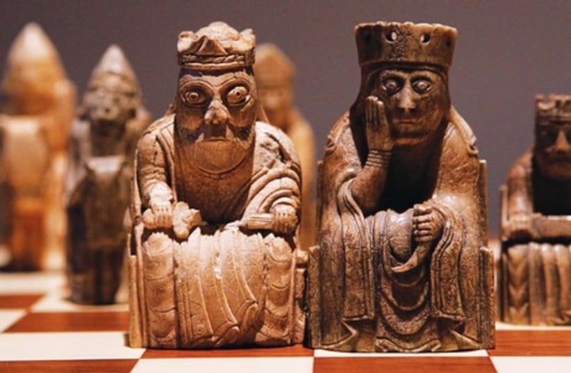 An old wooden chessboard depicts King David. (photo credit: REUTERS)