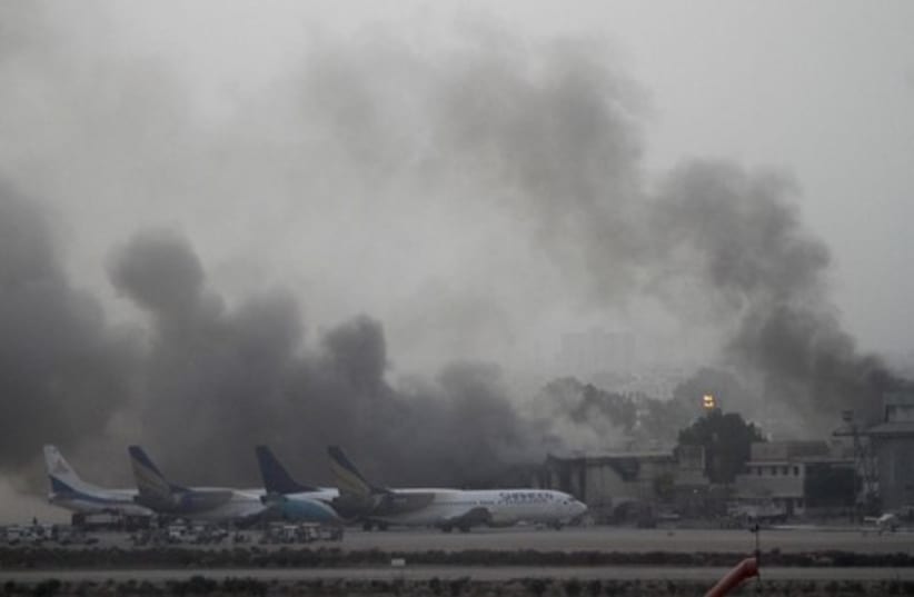 Pakistani Taliban attack Jinnah International Airport in Karachi  (photo credit: REUTERS)