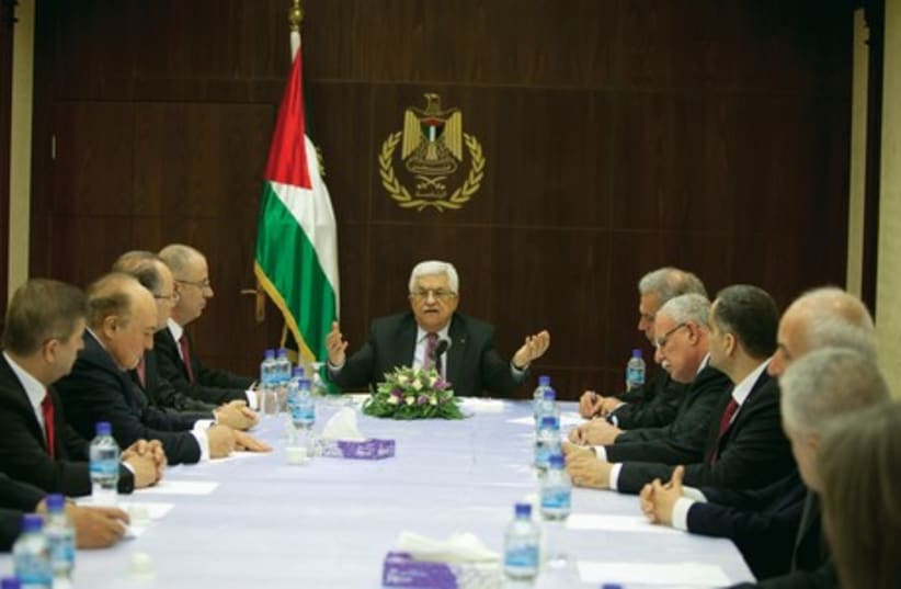 Palestinian President Abbas meets with ministers of the unity government in Ramallah (photo credit: REUTERS)