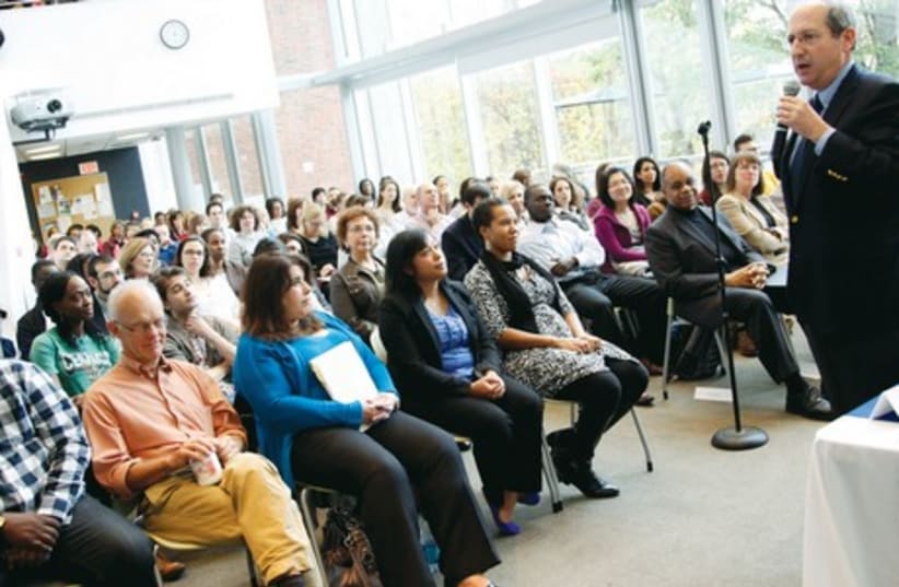 Frederick Lawrence presents the keynote speech on the state of diversity and equity at the Heller School of Social Policy and Management at Brandeis last fall. (photo credit: MIKE LOVETT)