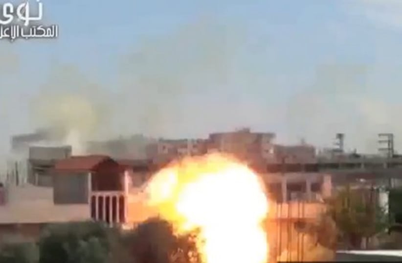 Fighting in Syrian city close to Israel border (photo credit: screenshot)