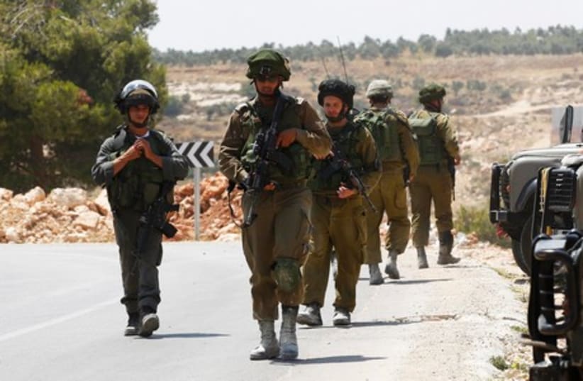 Israeli forces searching for three Jewish teenagers who went missing (photo credit: REUTERS)