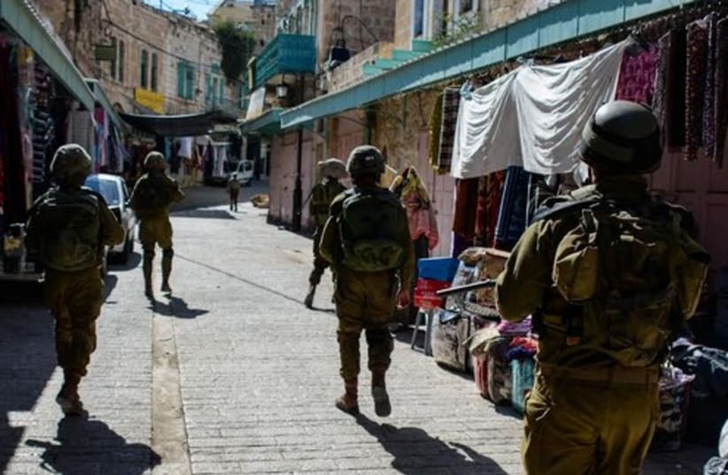 IDF trooops in Hebron on June 14, 2014. (photo credit: IDF SPOKESMAN'S OFFICE)