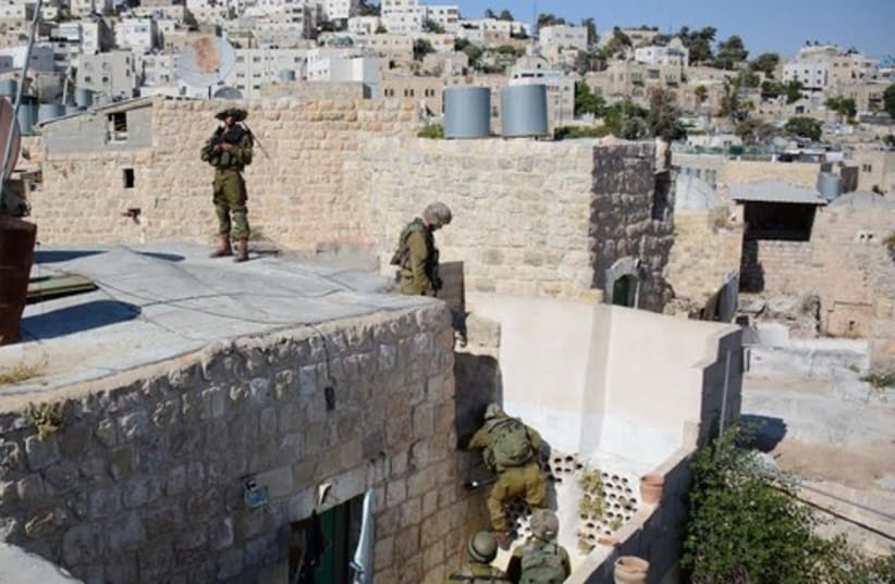 IDF trooops in Hebron on June 14, 2014. (photo credit: IDF SPOKESMAN'S OFFICE)