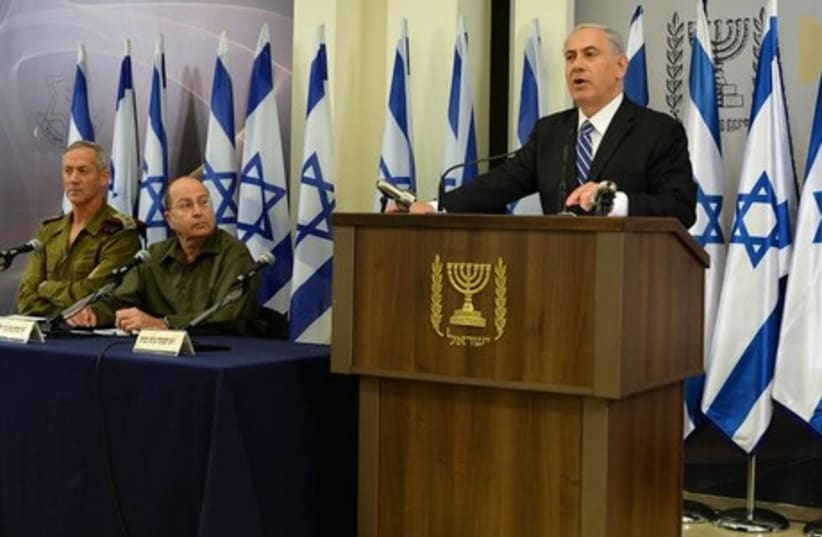 PM Netanyahu holds a press conference concerning the kidnapping of three Israeli students (photo credit: GPO)