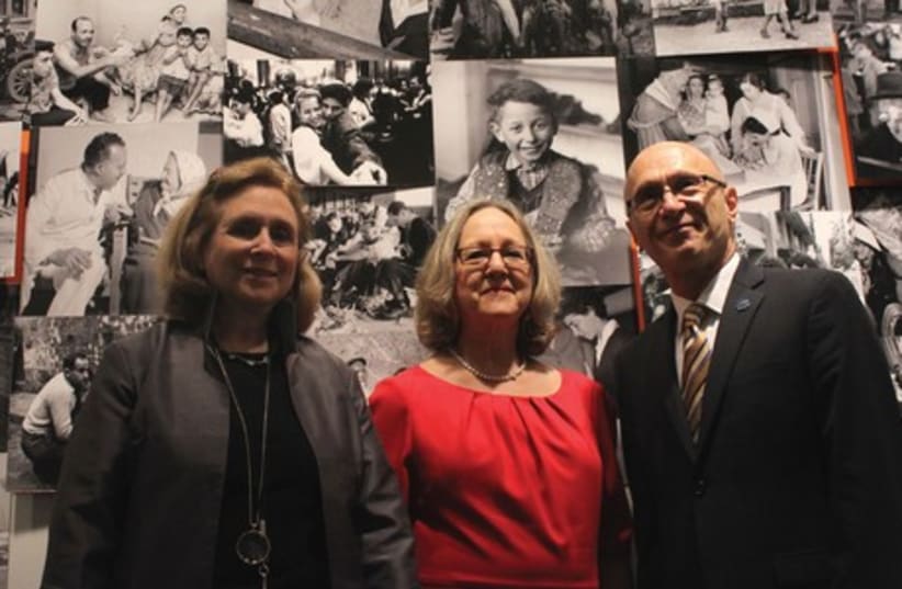 MARILYN SATIN Kushner, curator at the New York Historical Society, Linda Levi, co-curator and director of global archives at the JDC and Alan Gill, CEO of the JDC. (photo credit: MAYA SHWAYDER)
