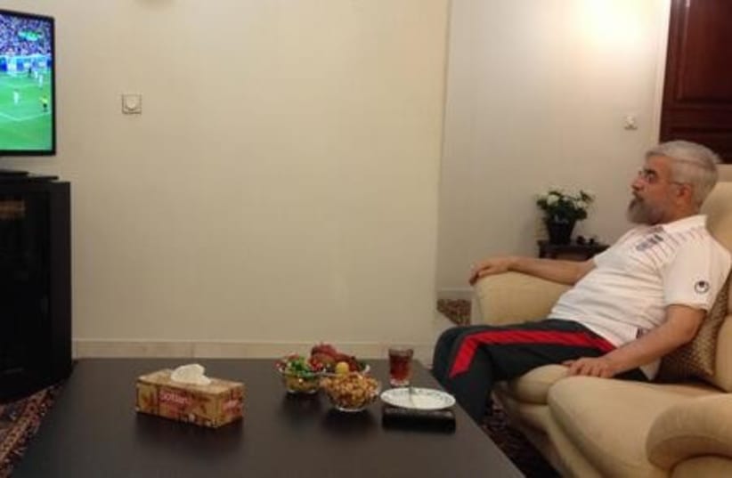 Iranian President Hassan Rouhani watches World Cup  (photo credit: TWITTER)
