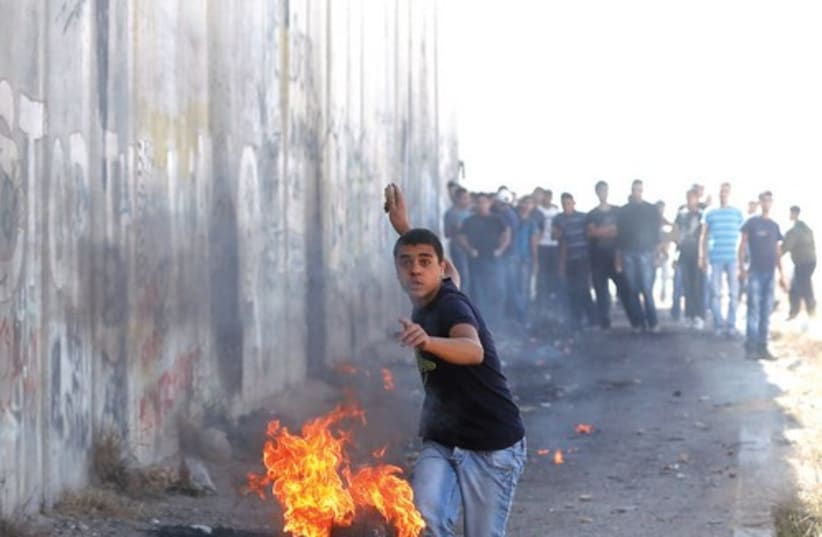 Palestinian incitement activity has continued unabated (photo credit: REUTERS/MOHAMAD TOROKMAN)