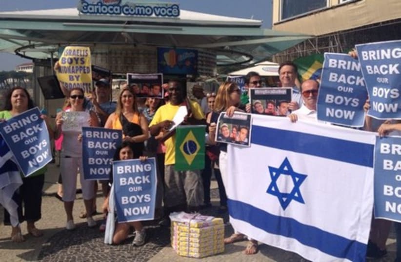 Brazilian Jews hold a demonstration at the site of the World Cup in Rio De Janeiro, June 17, 2014. (photo credit: OFFICE OF DEPUTY RELIGIOUS AFFAIRS MINISTER ELI BE)