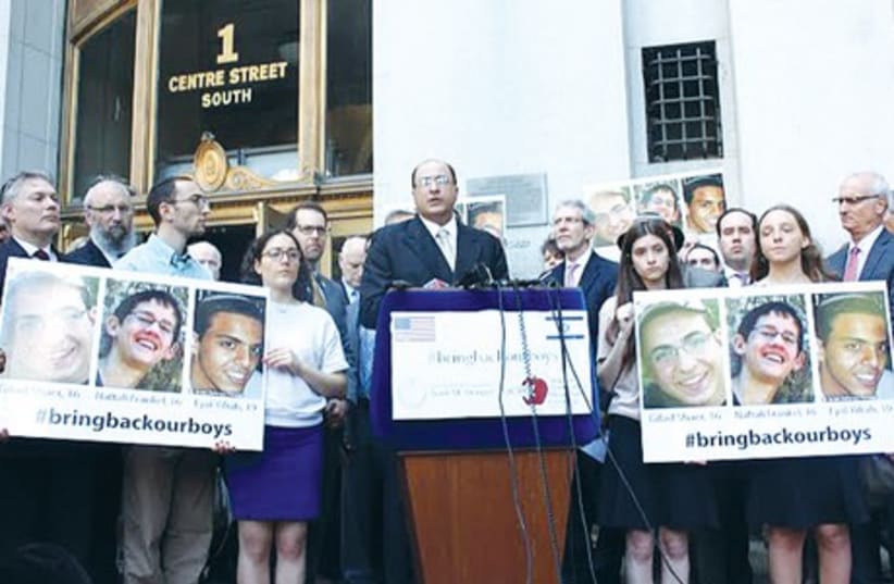 Ido Aharoni, Israel’s consul-general in New York, addresses a cross-community NYC rally for the three abducted teenagers yesterday. (photo credit: MAYA SHWAYDER)