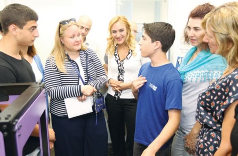 The ETF delegation visits the Amal school’s entrepreneurship center in Hadera on Tuesday. (photo credit: Courtesy)