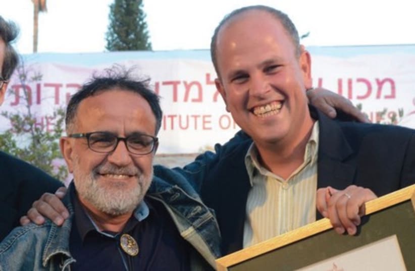 Liebhaber Prize recipients Ehud Banai (left) and Dr. Micah Goodman. (photo credit: AVI HAYOUN)