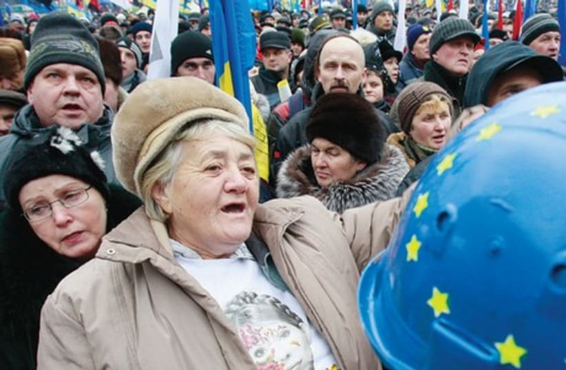 Ukrainians rally in support of EU integration at Independence Square in central Kiev in December. (photo credit: REUTERS)