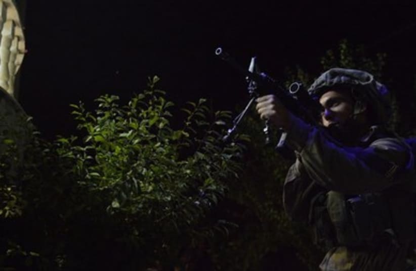 IDF soldiers from the Paratroopers Brigade search for the missing teens near Hebron. (photo credit: IDF SPOKESMAN'S OFFICE)