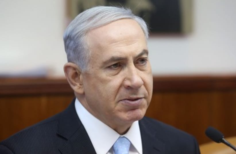 Prime Minister Binyamin Netanyahu at the weekly cabinet meeting on Sunday, June 22, 2014. (photo credit: MARC ISRAEL SELLEM/THE JERUSALEM POST)