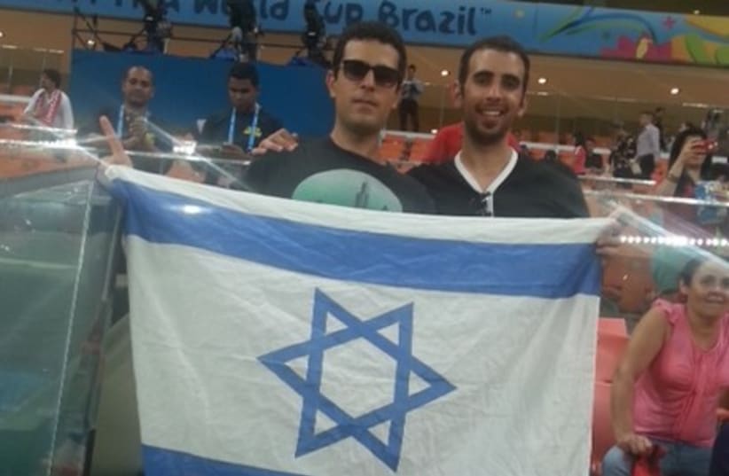 Brothers Dror (left) and Oren Ruhana, cheering at the game between USA and Portugal in Manaus, Brazil on June 22, 2014. (photo credit: MOSHE ARENSTEIN)