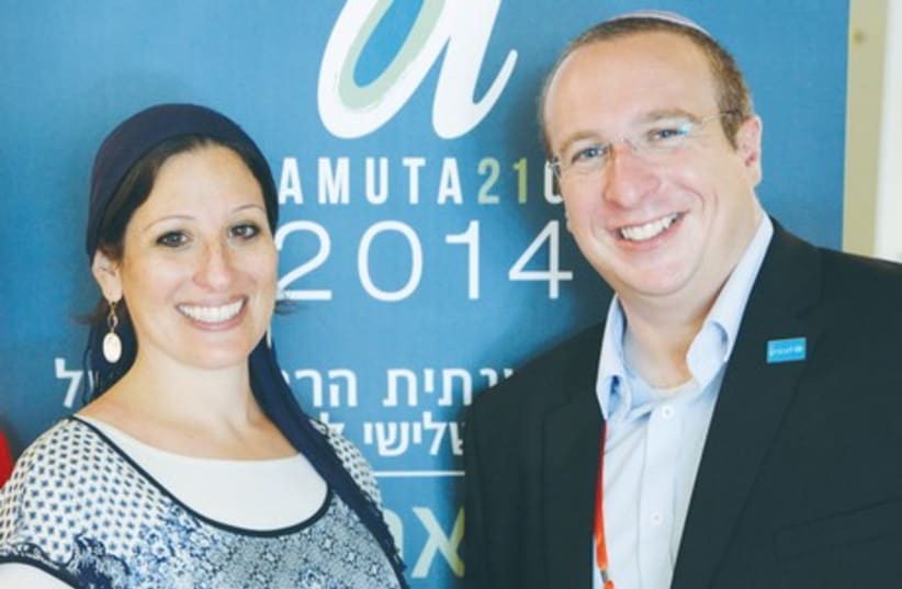 Founder and co-producer of Amuta21C Shoshana Jaskoll and Israel UNICEF CEO Jonny Cline attend the fourth annual Amuta21C conference in Tel Aviv, June 24, 2014. (photo credit: DONIDIGITAL PHOTOGRAPHY)