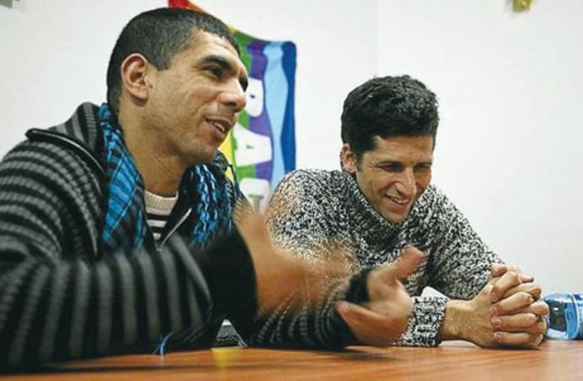 Sulaiman Khatib (left) and Avner Wishnitzer, co-directors for the NGO Combatants for Peace, speak during an interview in 2006. (photo credit: COURTESY SULAIMAN KHATIB)