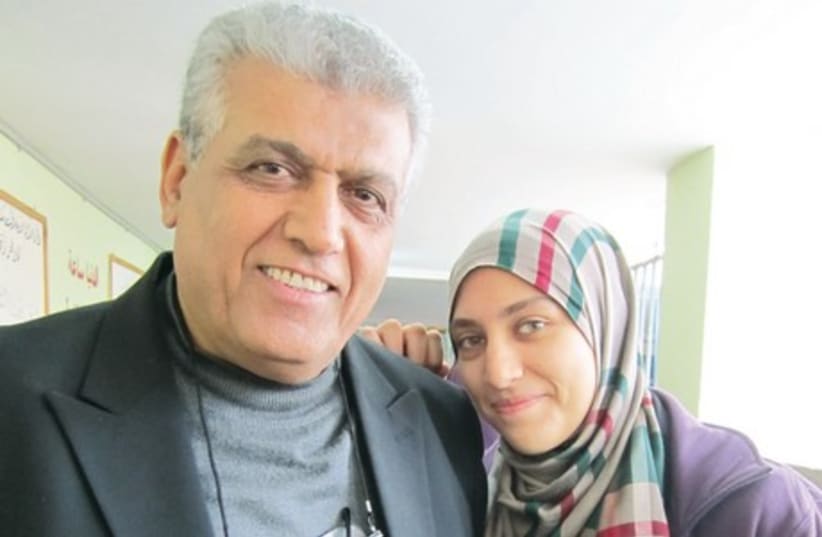 Principal of Jatt high school Saleh Gharrah and his 16-year-old daughter, Aseel (photo credit: GALIA KASPI SPRUNG)