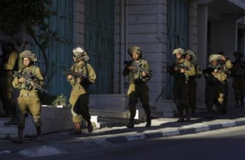 IDF in an operation to locate three Israeli teens near the West Bank City of Hebron. (photo credit: REUTERS)