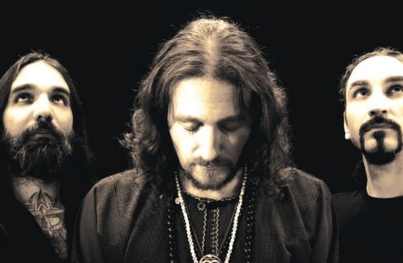 ‘WE ARE in a streaming world these days. Everything is accessible today and it’s a blessed idea, despite the fact that it’s not as romantic as it used to be,’ says Kobi Farhi (middle) of the popular Israeli group Orphaned Land (photo credit: AMI BERNSTEIN)