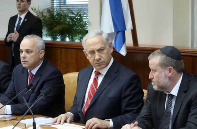 Prime Minister Binyamin Netanyahu speaks at the weekly cabinet meeting, June 29, 2014 (photo credit: MARC ISRAEL SELLEM/THE JERUSALEM POST)