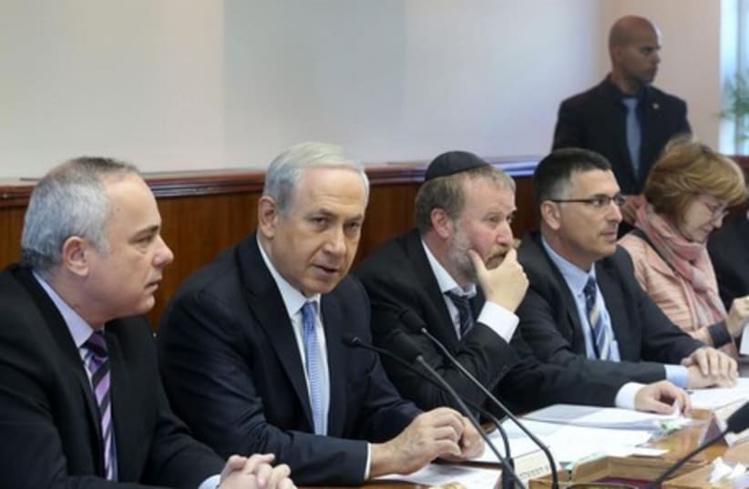 Prime Minister Binyamin Netanyahu speaks at the weekly cabinet meeting, June 29, 2014 (photo credit: MARC ISRAEL SELLEM/THE JERUSALEM POST)