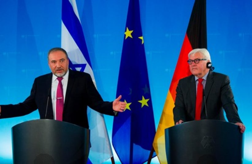 FM Liberman and German counterpart Frank-Walter Steinmeier (photo credit: REUTERS)