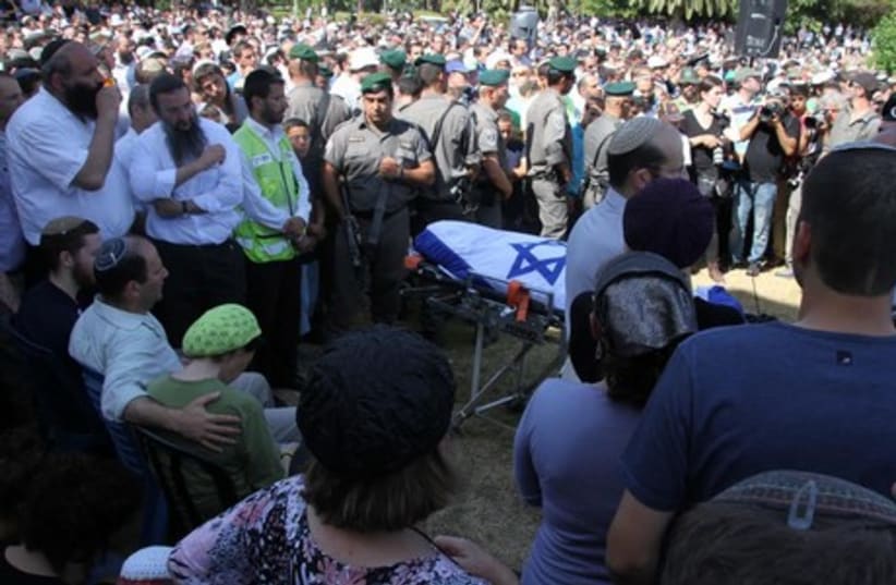 The Fraenkel family at the funeral for their slain son Naftali, July 1, 2014. (photo credit: TOVAH LAZAROFF)