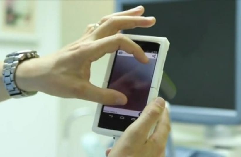Detecting cancer with a mobile phone (photo credit: ELI MANDELBAUM)