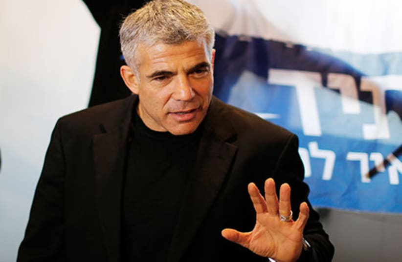Finance Minister Yair Lapid (photo credit: REUTERS)