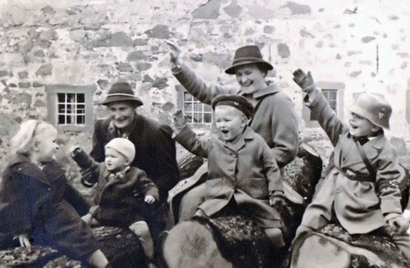 Children doing a Hitler salute in 1938 (photo credit: COURTESY FRIEDEMANN DERSCHMIDT)